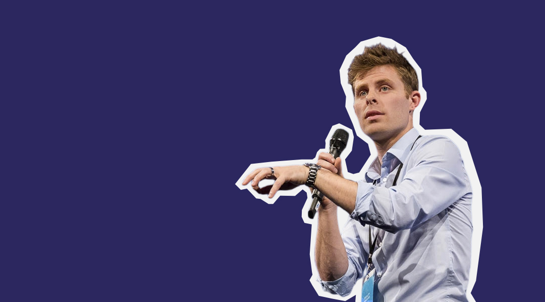 Image of male presenter speaking with microphone